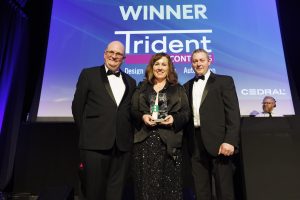 Pictured John Bradly, Etex Ireland and Lorraine McNamara and Patrick McNamara, Trident Controls, winner of Construction and Engineering, sponsored by Cedral at the 2024 Guaranteed Irish Business Awards, proudly supported by PTSB.